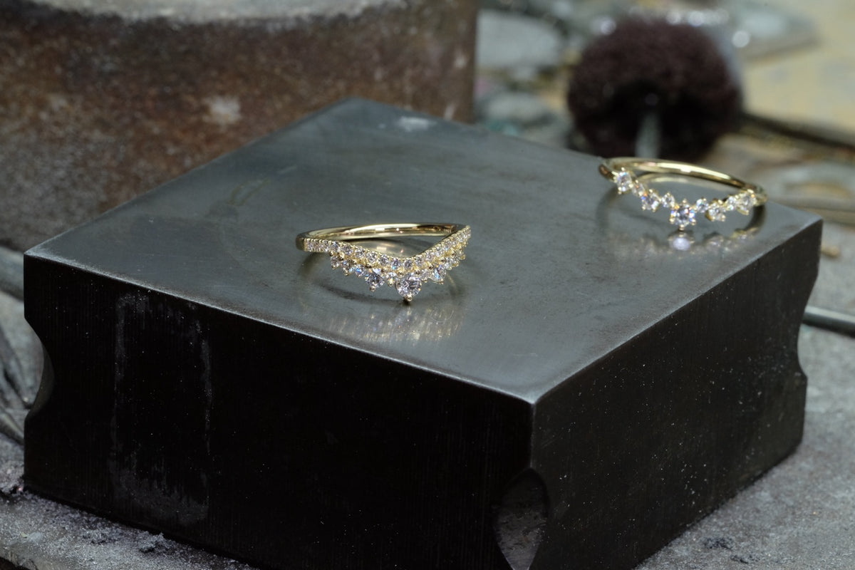 Chevron and contoured diamond bands in 18k yellow gold