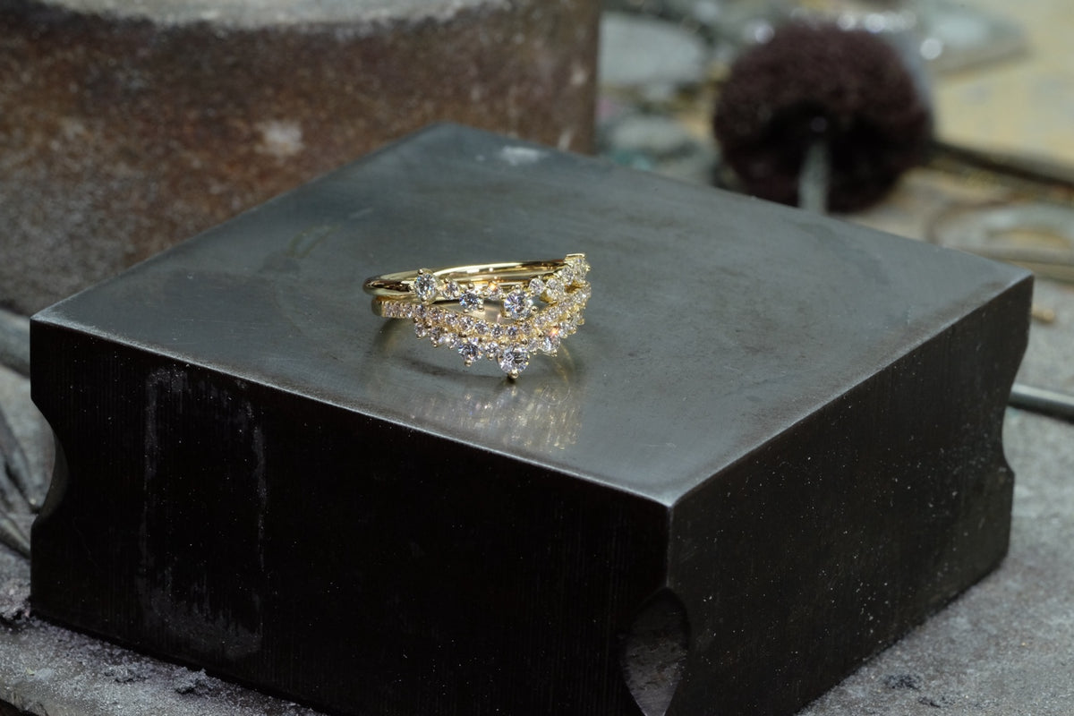 Two diamond nesting bands worn together