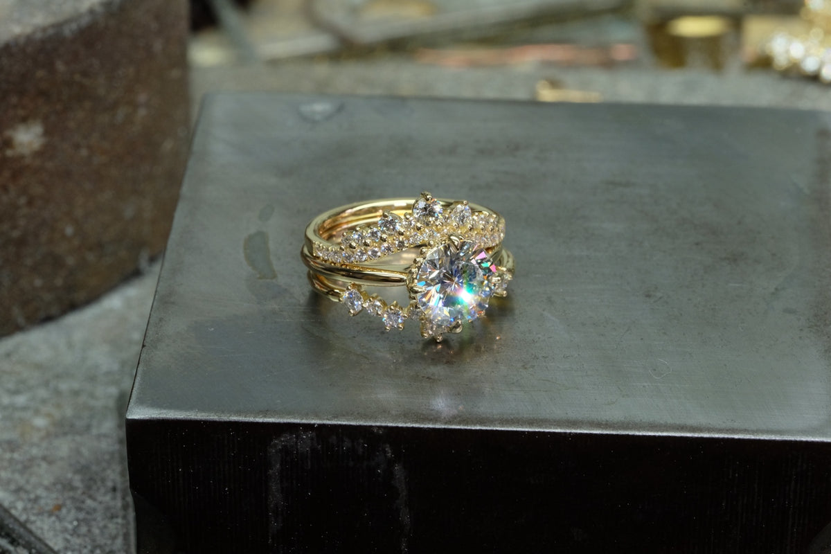 Three-ring diamond solitaire and nesting band composition