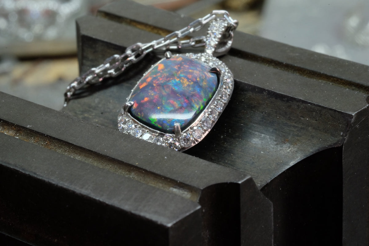 Opal & Diamond Halo Pendant, close-up side view