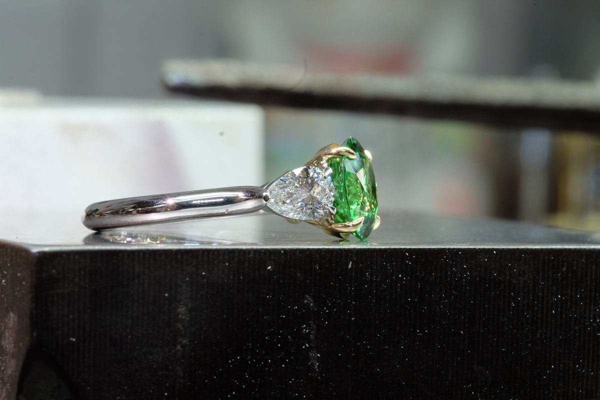 Oval Emerald & Pear Diamond Three-Stone Ring, opposite side view