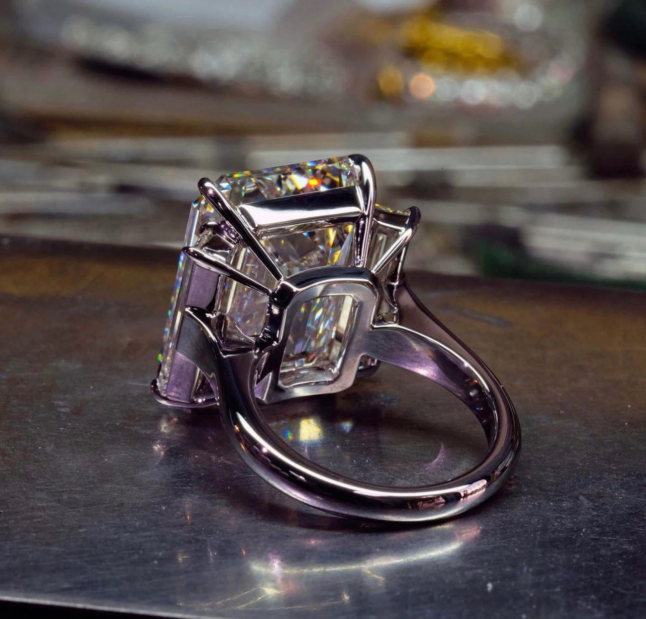 EMERALD CUT 3 STONE RING