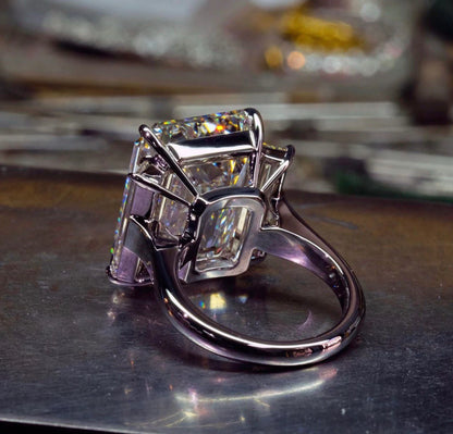 EMERALD CUT 3 STONE RING