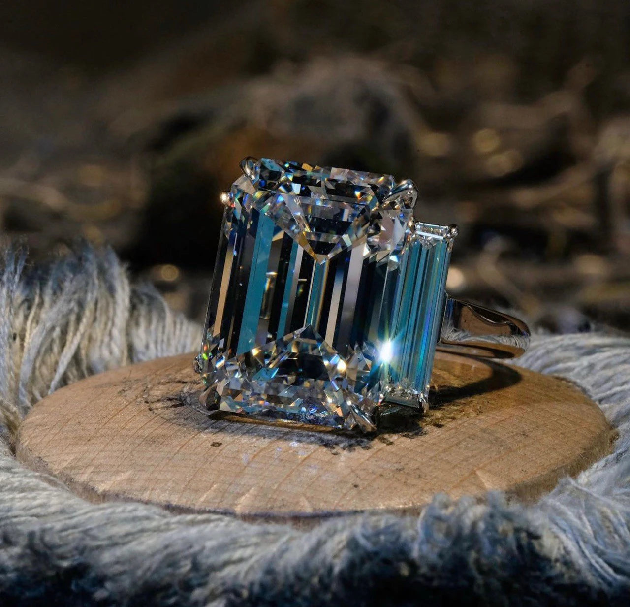 EMERALD CUT 3 STONE RING