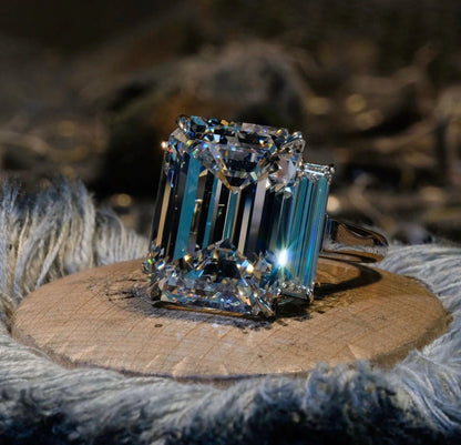 EMERALD CUT 3 STONE RING