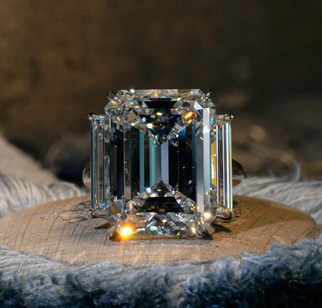 EMERALD CUT 3 STONE RING