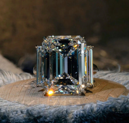 EMERALD CUT 3 STONE RING