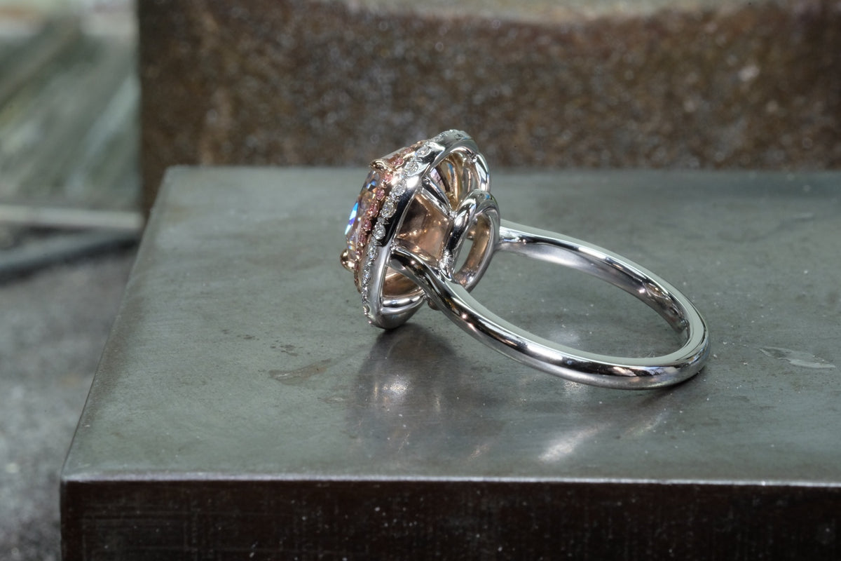 Side and open gallery detail of the platinum pink diamond double halo ring