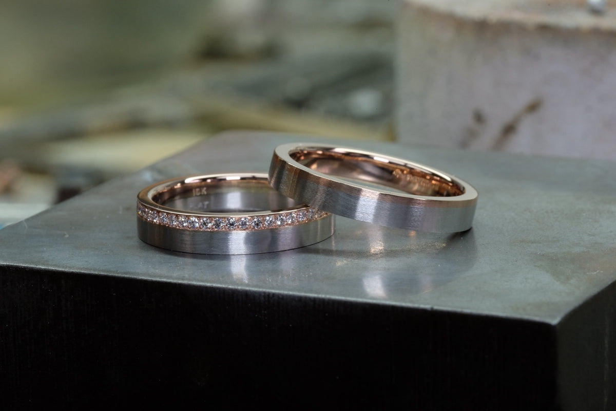 Platinum & Rose Gold Union Bands, paired angled view