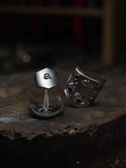 Sapphire-set reverse of platinum cufflinks